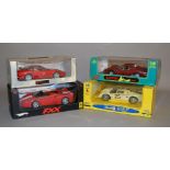 Four boxed diecast Ferrari model cars in 1:18 scale, an Anson 246GT,