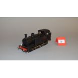 O Gauge. An electric kit-built 0-6-0 Pannier Tank locomotive in black.