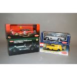 Four Kyosho 1:18 scale diecast models: Mercedes-Benz 300SL; Mini Van AA Service;