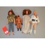 Four Kenner Star Wars large size action figures: Luke Skywalker; two Princess Leia Organa; Jawa.