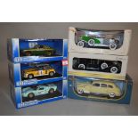 Six 1:18 scale diecast models: three Universal Hobbies (MGB GT, Renault 5 Turbo,