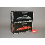Two Minichamps 1:18 scale diecast Porsche models: 100 063022 Porsche 911 Carrera Coupe 1983;