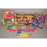 Eight boxed toys,