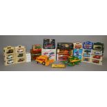 A mixed group of boxed diecast models by Lledo, Corgi, Bburago and others,