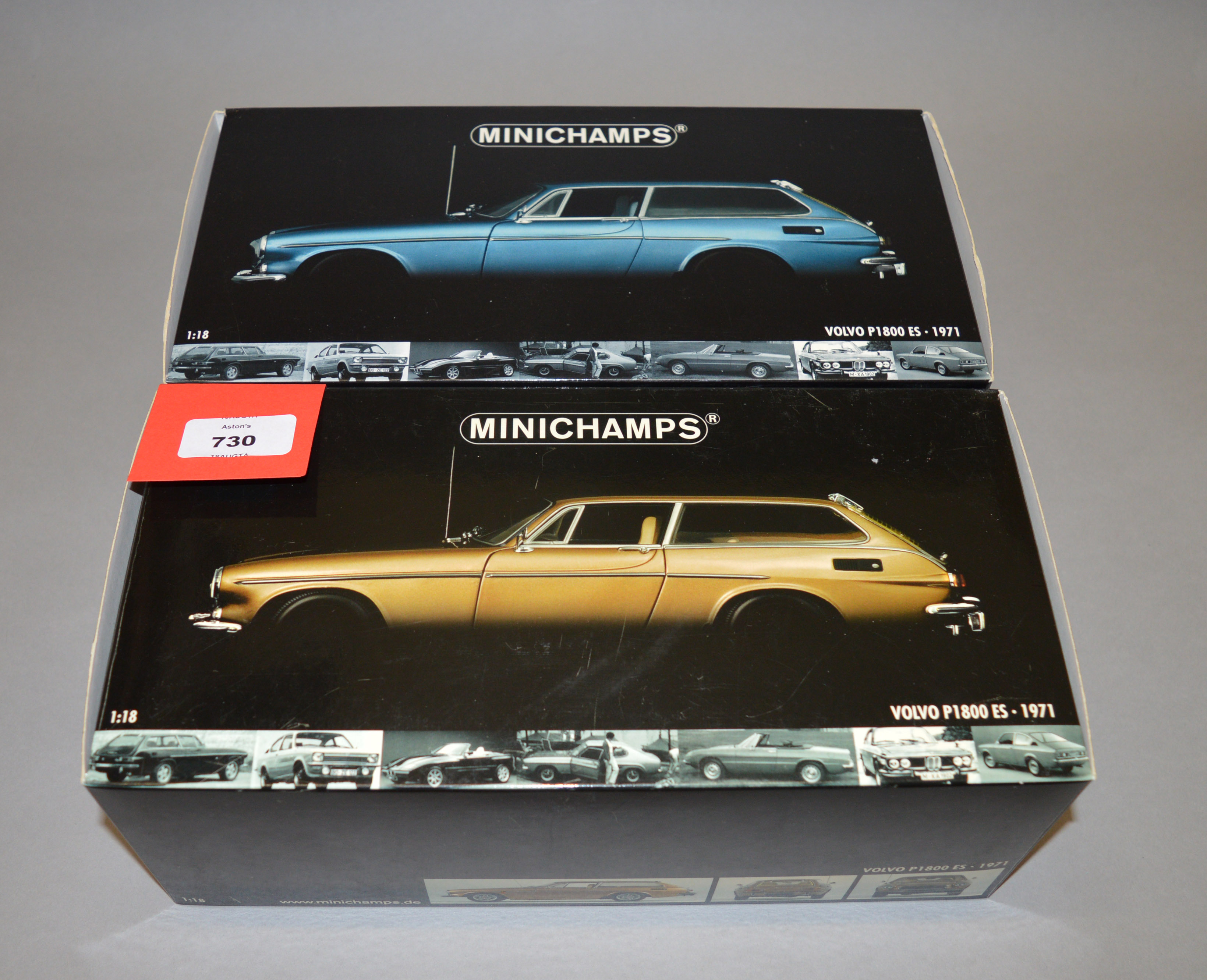 Two boxed Minichamps Volvo P1800 ES (1971) diecast model cars in 1:18 scale,