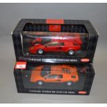 Two boxed Kyosho Lamborghini Countach diecast model cars in 1:18 scale,