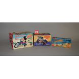 Three plastic toys: Marx Walt Disney's Mickey Mouse Little Big Wheel;