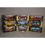 Nine Bburago 1:18 scale diecast model cars, including Alfa Romeo, Maserati, Lancia, etc. VG, boxed.