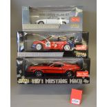Three Sun Star 1:18 scale diecast model cars: 4054 1966 Lotus Elan; 1971 Mustang Mach I;