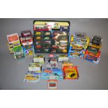 A good quantity of boxed and carded diecast models by various manufacturers including a number of