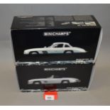 Two boxed Minichamps Mercedes Benz 300 SL diecast model cars in 1:18 scale,