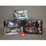 Five diecast models: five 1:18 scale cars by Maisto and Shell;