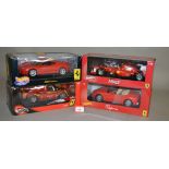 Four Mattel Hot Wheels 1:18 scale diecast Ferrari models. E in G-VG boxes.