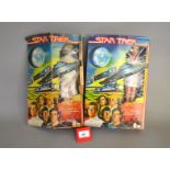 Two Mego Star Trek 12" action figures: Arcturian; Ilia. VG in P-F boxes.