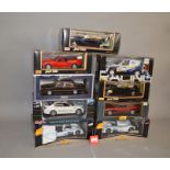 Nine BMW 1:18 scale diecast model cars by Maisto, Norev and Solido. VG in G-VG boxes.