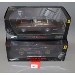 Two boxed Hot Wheels Elite Ferrari diecast model cars in 1:18 scale,