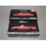 Two boxed Minichamps Alfa Romeo diecast model cars in 1:18 scale,