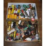 Quantity of playworn diecast models, including Corgi, Dinky, etc. Contained in two trays.