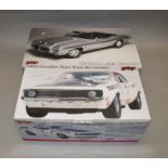 Two boxed gmp diecast model cars in 1:18 scale,