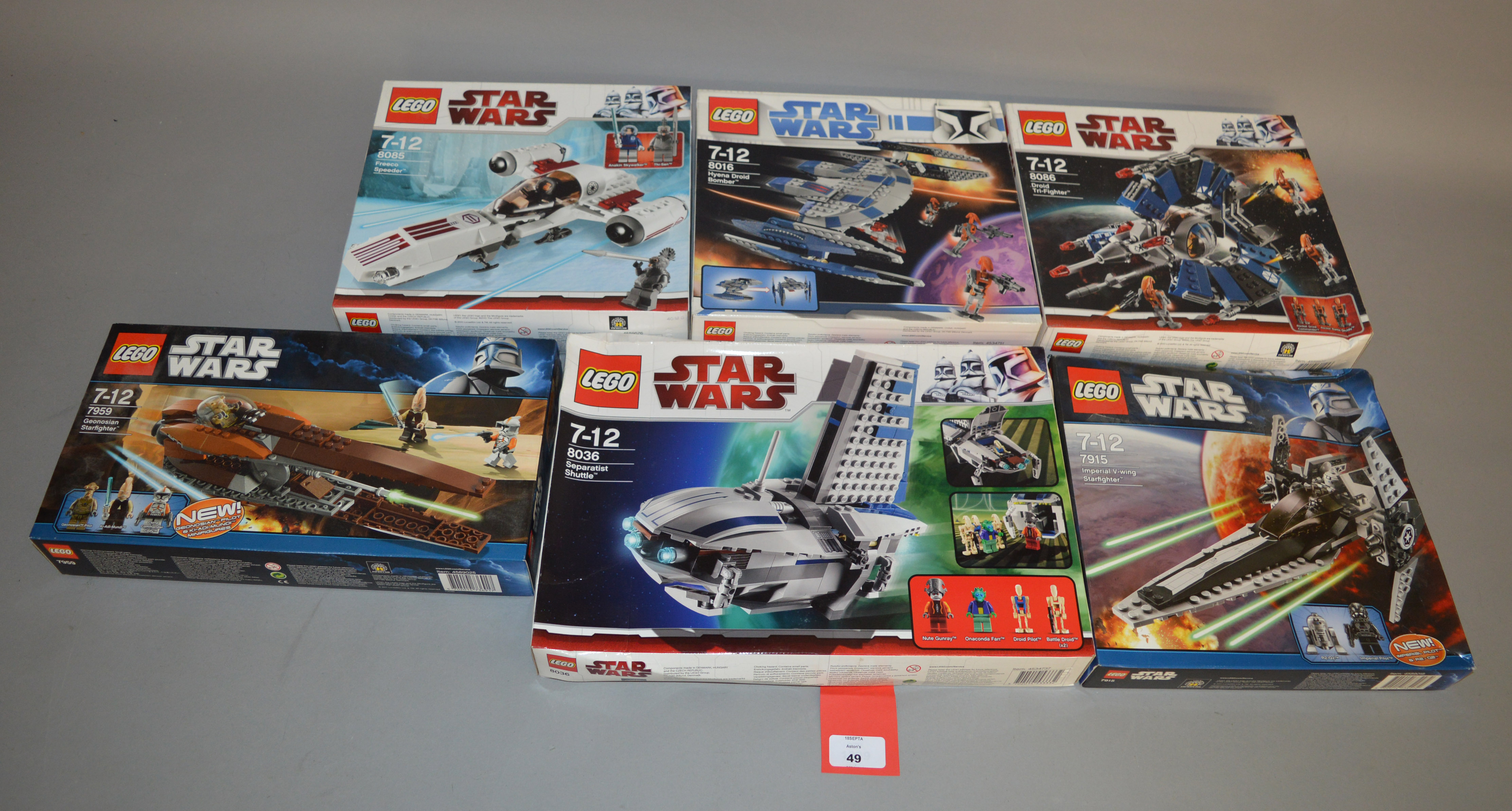 Lego Star Wars sets: 7915 Imperial V-wing Starfighter; 7959 Geonosian Starfighter;