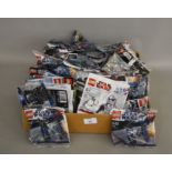 143 x Lego Star Wars mini sets, all sealed in bags.
