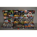 Nine Lego Star Wars Advent Calendars: two 9509; 75056; 75184; two 75023; three 7958.