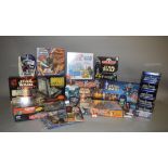 A good quantity of Star Wars related games and trading cards including 'Monopoly', 'Guess Who?',
