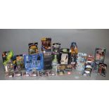 A quantity of boxed and carded Star Wars figures of various types including a Hasbro 12 inch POTF