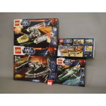 Four Lego Star Wars sets: 9500 Sith Fury-class Interceptor; 9495 Gold Leader's Y-wing Starfighter;