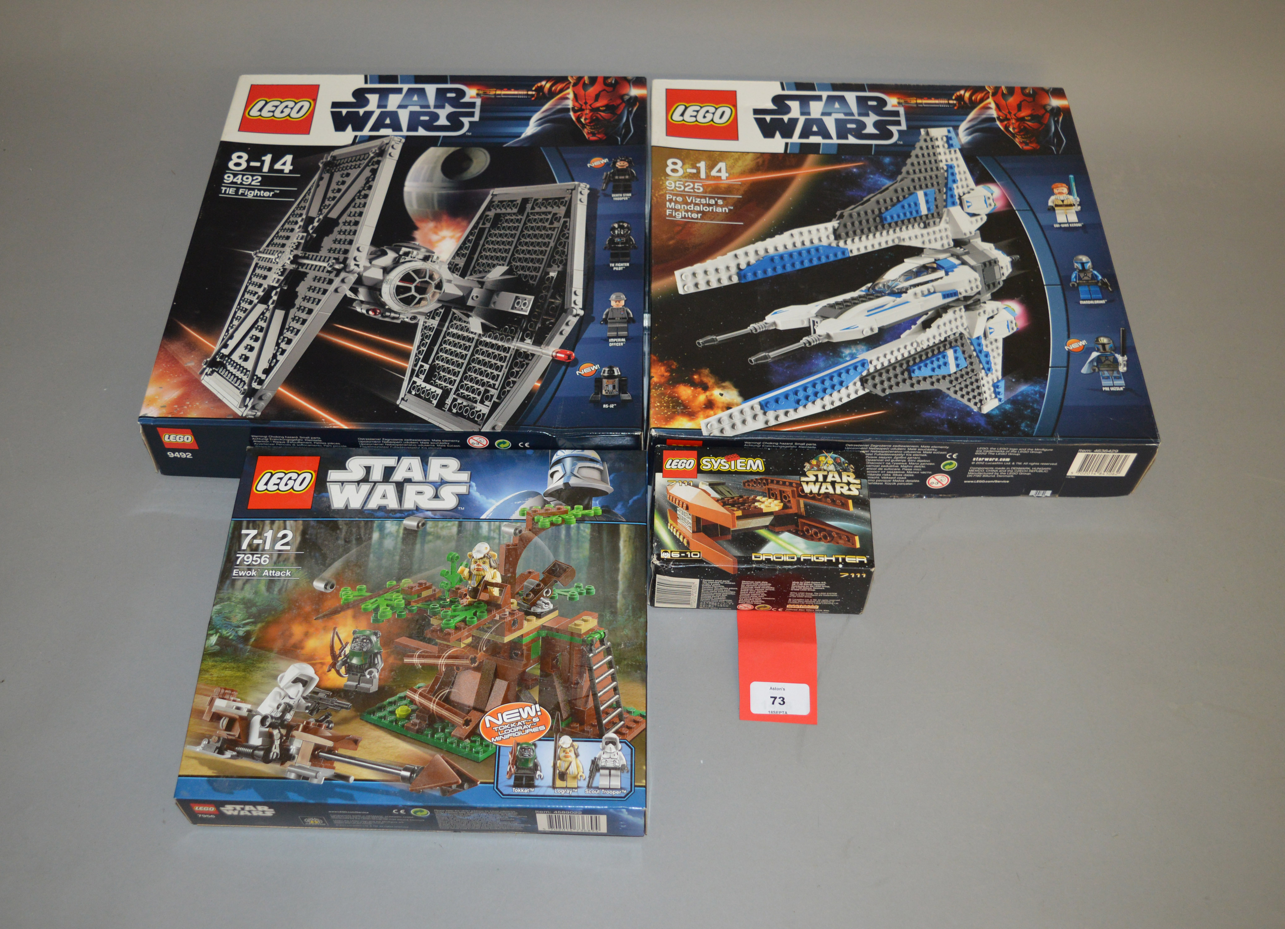 Four Lego Star Wars sets: 9492 TIE Fighter; 9525 Pre Vizsla's Mandalorian Fighter; 7956 Ewok Attack;