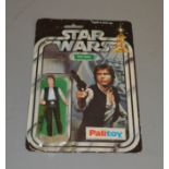 Palitoy Star Wars Han Solo 3 3/4" action figure on a 12 back card.