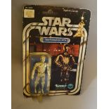 Kenner Star Wars C-3PO (See-Threepio) 3 3/4" action figure, sealed on a 12 back card.