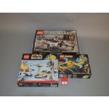 Three Lego Star Wars sets: 4502 X-wing Fighter; 7749 Echo Base; 7141 Naboo Fighter. All sealed.
