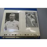 A folder containing a signed photo by Bobby Moore whilst playing for Fulham FC,