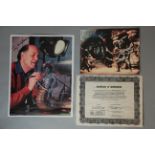 Ray Harryhausen signed photograph featuring the special effects maestro adding the finishing