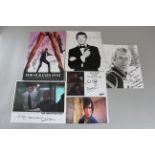 Roger Moore signed photo together with "For Your Eyes Only" signed photos including Peter Fontaine,
