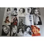 A collection of signed photos mostly 10 x 8 inch including Madeline Smith x2, Maggie Smith,