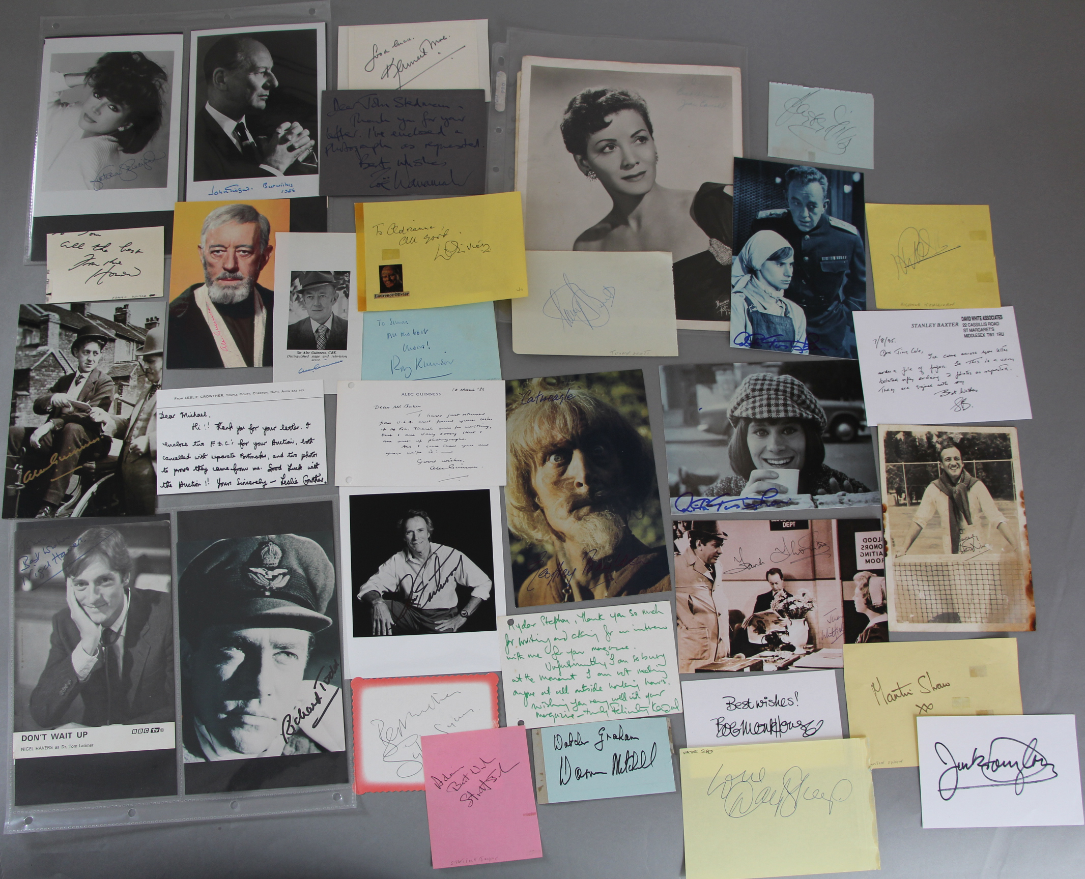 A collection of autographs including Alec Guinness signed in gold pen, red, blue & black pen,