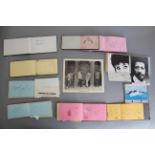 9 assorted autograph books, a signed photo of Dave Dee, Dozy, Beaky, Mick & Tich (10 x 9 inch),
