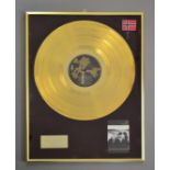 U2 Norwegian Gold Disc awarded to The Edge for sales of more than 50 000 copies The Joshua Tree,