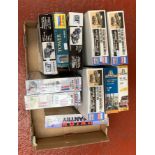 11 x plastic model kits, all military, by Emhar, Hasegawa, Italeri and similar.