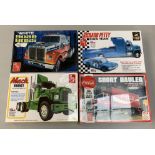 Four AMT 1:25 scale plastic model kits, all trucks: 1039.