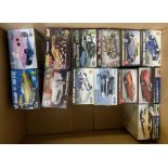 13 x plastic model kits by Revell, Monogram and others, mostly 1:24 scale cars.