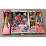 Four Hasbro Sindy dolls: Super Cool Sindy; Super Cool Paul; Party Lights; Mundo Maravilloso.