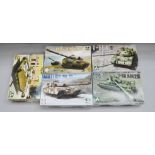 Five Takom 1:35 scale plastic model kits: three Chieftain tanks; two T-55 tanks. E, unused.