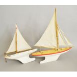 Two unboxed vintage Star Pond Yachts, 'Endeavour IV', 46cm long, and 'Ocean Star', 60cm long,