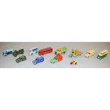 Twelve unboxed Dinky Toys diecast models with varying degrees of play wear,