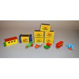 Five boxed Matchbox diecast models from the original 1-75 series including 1 Road Roller, 2 Dumper,