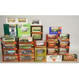 Fourteen boxed diecast model buses by EFE in 1:76 scale together with four EFE Bus Gift Sets,