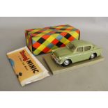 A boxed Tri-ang 'Minic Electric' Hillman Minx green plastic bodied battery operated car in 1:20